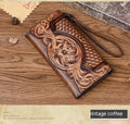 Women's brown tri-fold leather wallet with embossed floral pattern showing open compartments