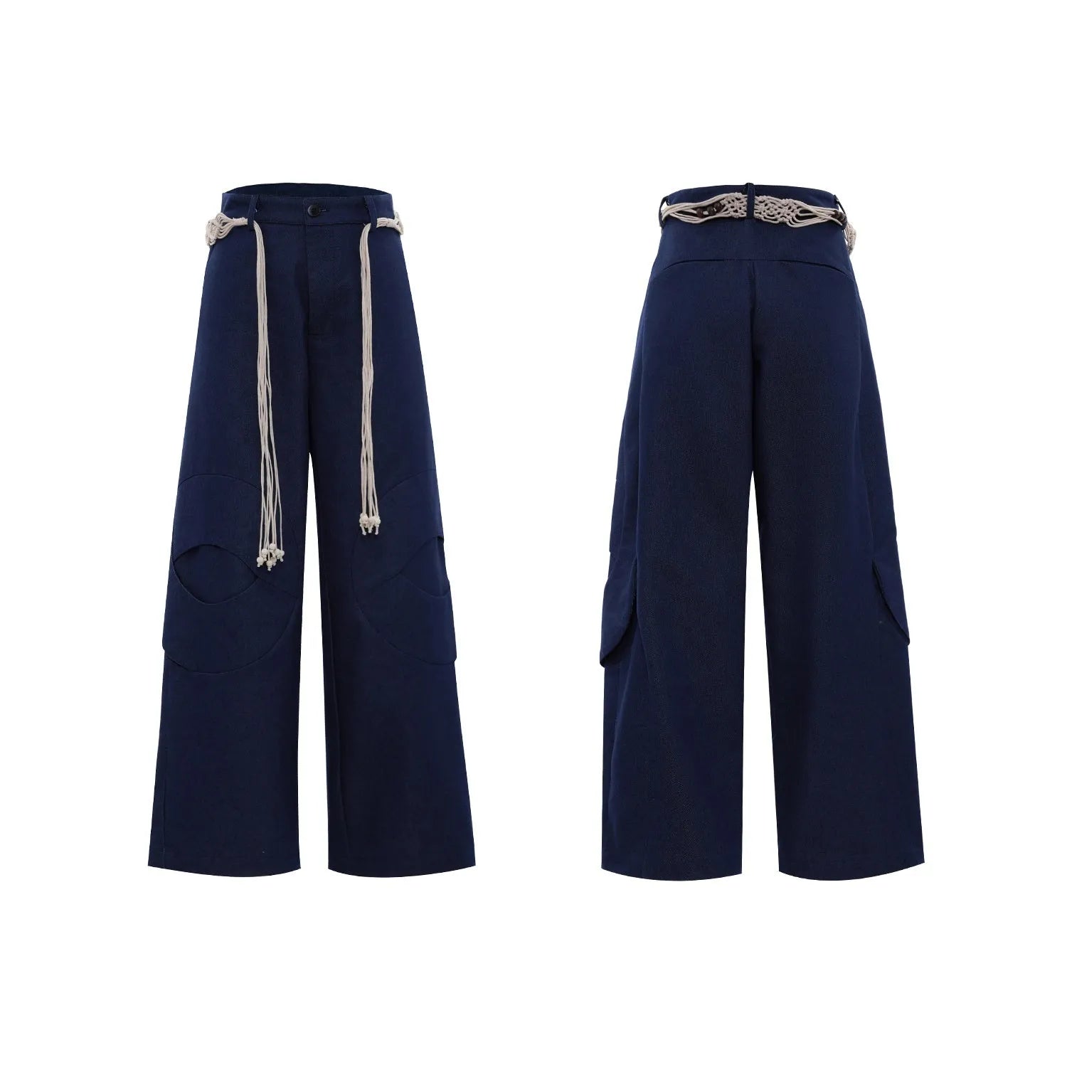 Man wearing dark blue straight-leg cotton jeans with loose fit, zipper decorations, and a tassel detail.