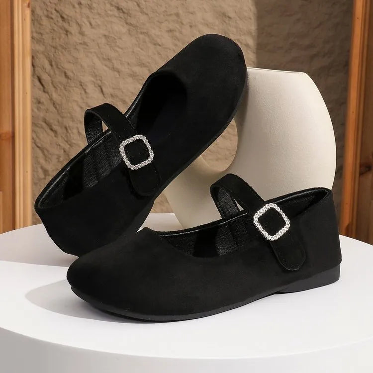 Solid black canvas fisherman shoes with low-top design and rubber sole