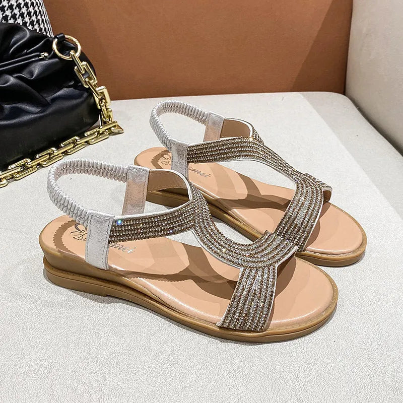 Women's patent leather summer sandals with rhinestone decoration in gold, silver, or black colours