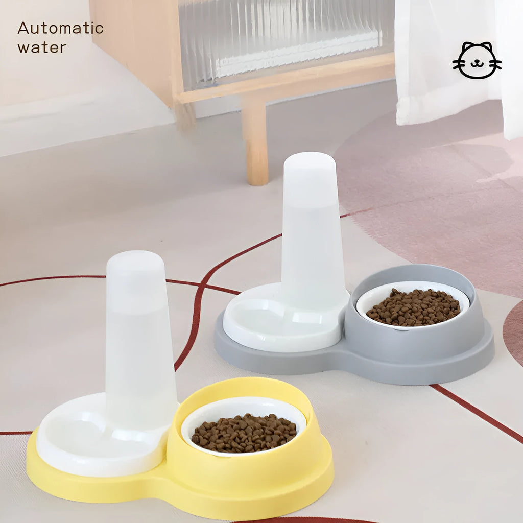 Grey and yellow pet dual feeding bowl with ceramic dish and stainless steel water dispenser on non-slip base