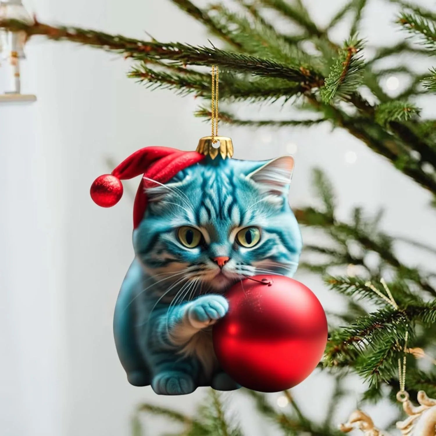 Colourful cartoon-style kitty cat Christmas ornament hanging, made from clear acrylic for car interiors.
