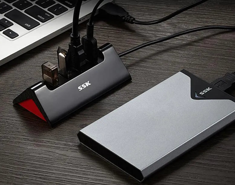 Black USB computer expansion dock with multiple USB ports and compact ABS plastic construction