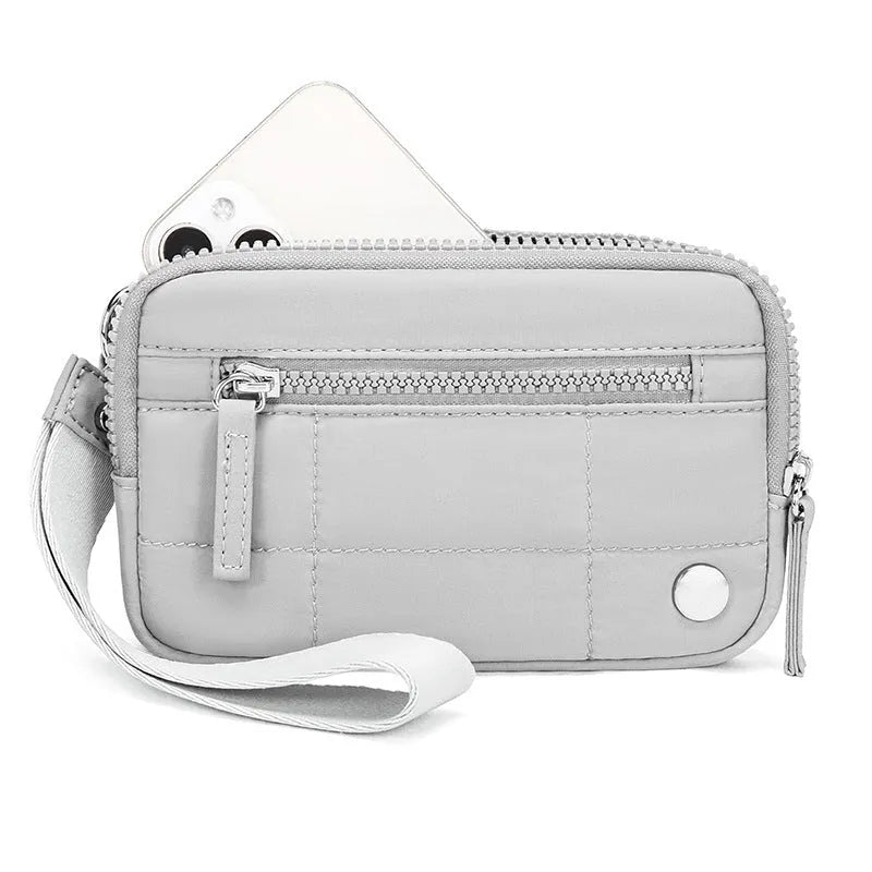 Waterproof quilted handbag with transparent deck section in nylon material
