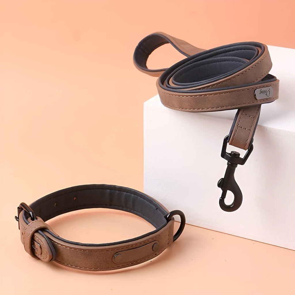 Adjustable dog collar on a white background showing PU front and microfiber back, in a choice of five colours.