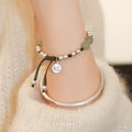 Handmade bamboo bracelet with green Hetian jade beads and 925 silver beads, lotus seedpod design