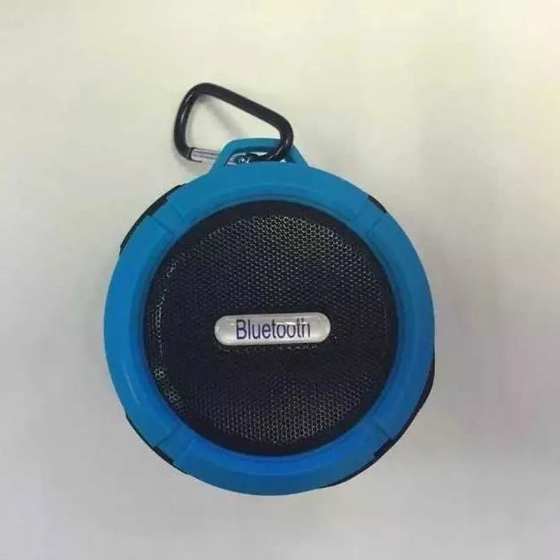 Portable waterproof Bluetooth speaker in multiple colours with bag clip for outdoor use