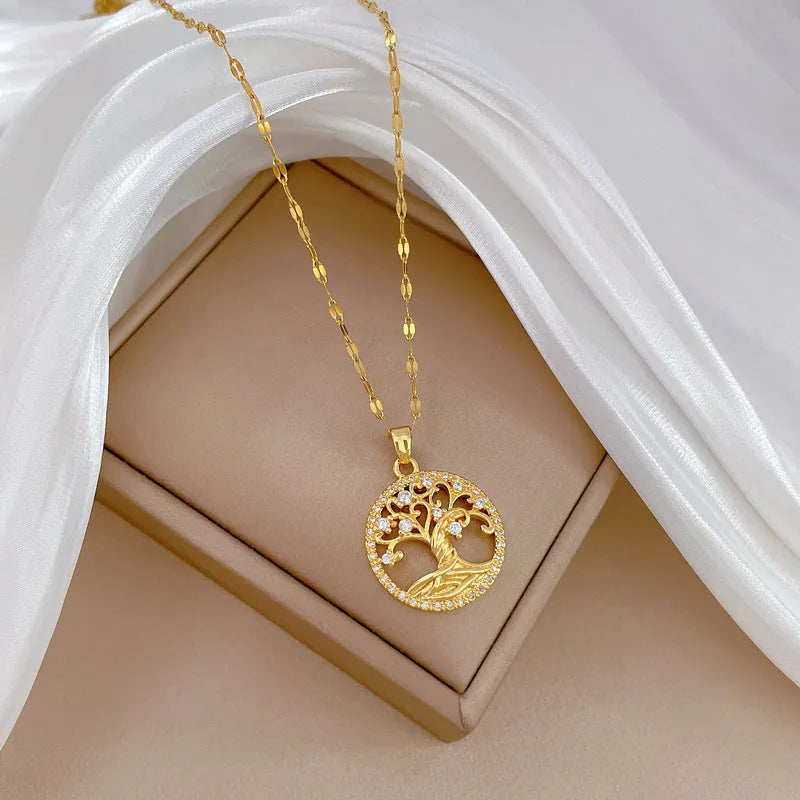 Gold-plated cross necklace with rhinestone lucky tree design and mother pearl shellfish pendant on adjustable chain
