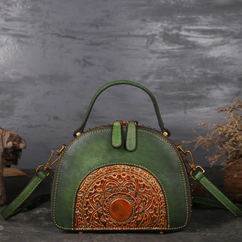 Vintage-style suede cowhide leather handbag with multiple internal organisation pockets.
