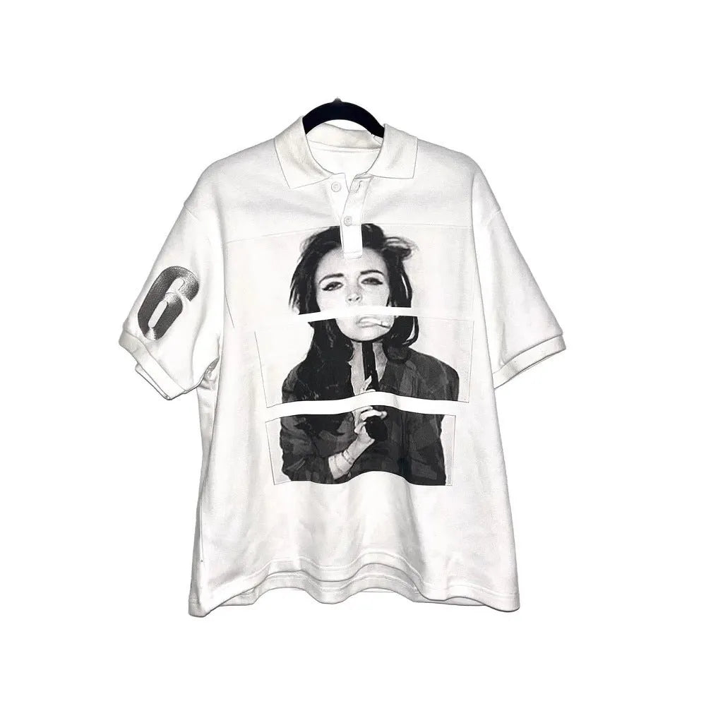 Short-sleeved printed polo shirt in polyester fabric on a hanger