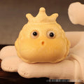 Solid bamboo carving of a cute Crown Princess Toad ornament, showing live eye detail.
