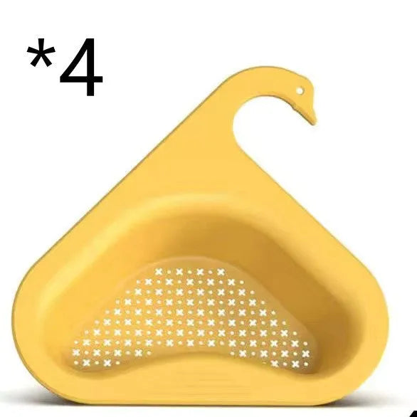 Yellow hanging swan drain basket made of plastic, fitted on a kitchen sink edge with space for vegetables and utensils