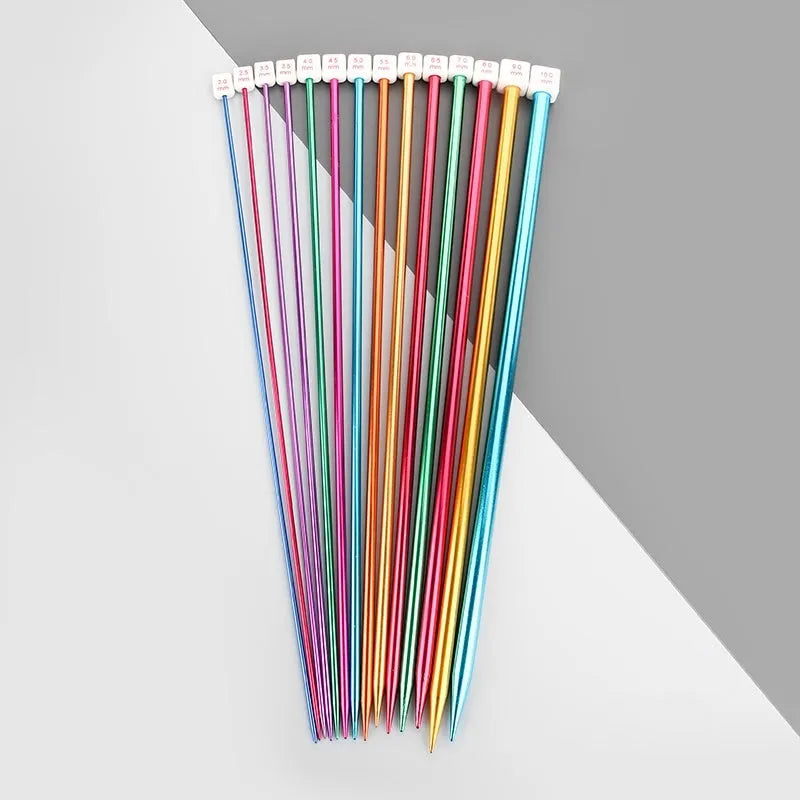 Set of lengthened crochet hooks with caps in 13 sizes from 2.0mm to 10.0mm, two hooks per size.