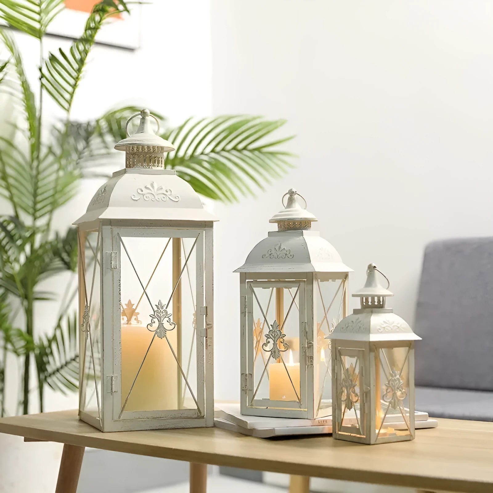Black and white gold wrought iron storm lantern with tempered glass in three sizes for courtyard decoration.