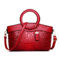 Fabric ladies casual handbag showing multiple compartments including zipper pocket and phone bag