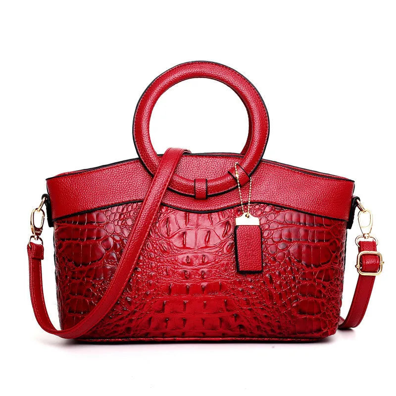 Fabric ladies casual handbag showing multiple compartments including zipper pocket and phone bag