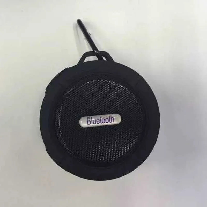 Portable waterproof Bluetooth speaker in multiple colours with bag clip for outdoor use