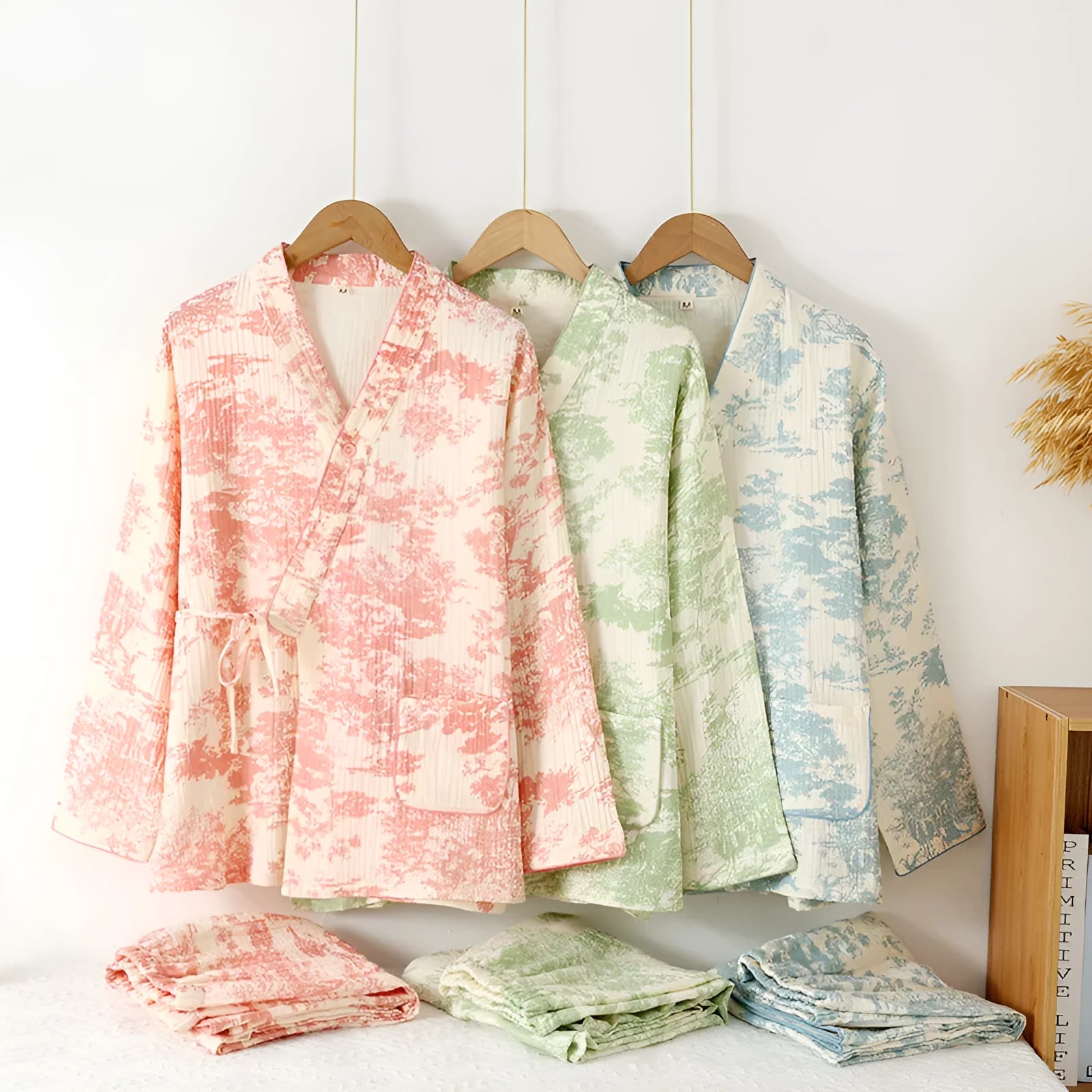 Women's pink pure cotton gauze lounge set with lace-up trousers and long sleeve top.