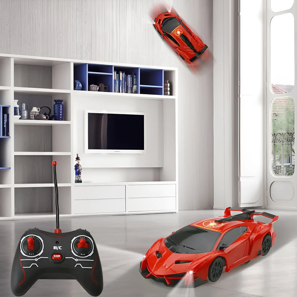 Remote control wall climbing car in red with industrial fan vents and white adsorbent strip on bottom, 1/28 scale