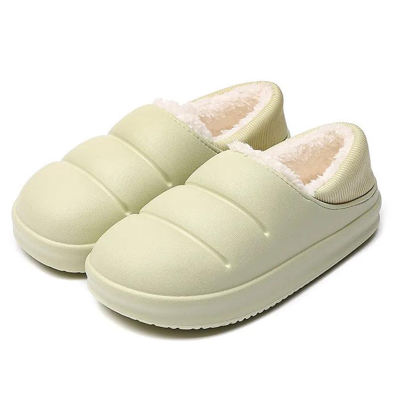 Women's waterproof EVA garden slippers in green, showing overshoe design with plush lining and non-slip sole.