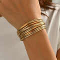 Multi-layer vintage leather bracelet with magnetic clasp, round alloy charms, in black colour