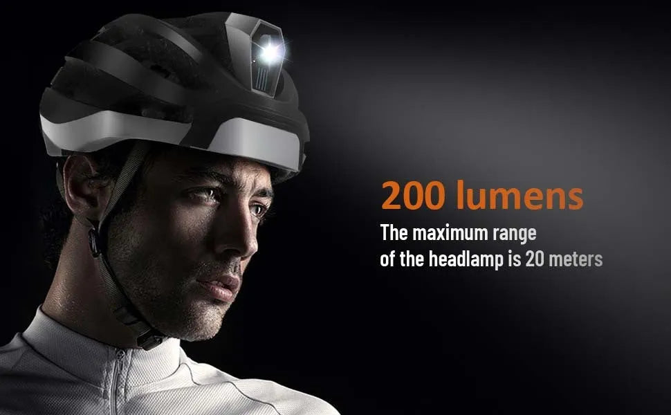 Black and grey smart cycling helmet with integrated Bluetooth warning light on the rear.
