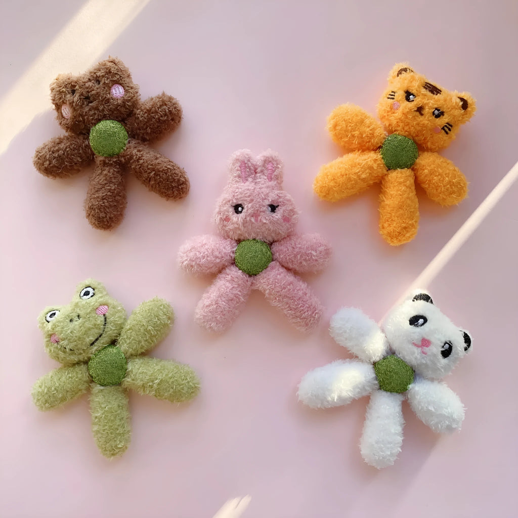 Edible catnip chewing ball in plush animal design with cat grass filling for dental cleaning