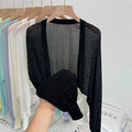 Women's linen blouse with hollow-out design and long lantern sleeves in apricot colour
