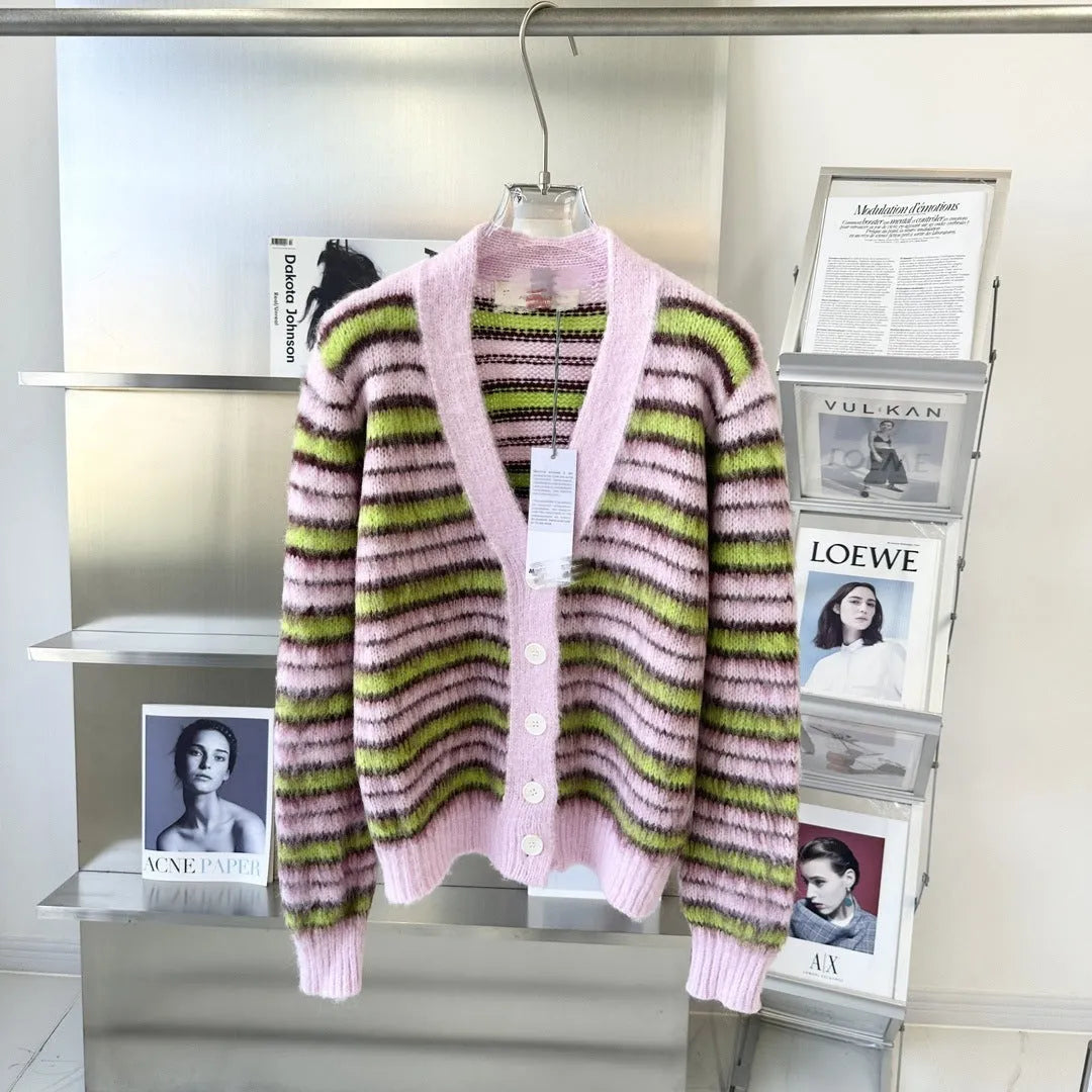 Pink wool knitted women's cardigan showing both round-neck pullover and open cardigan styles