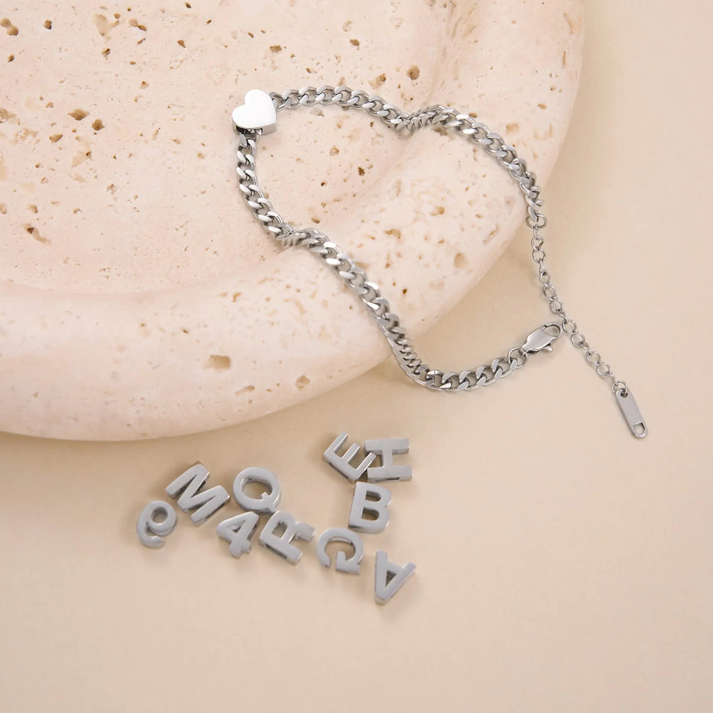 Gold electroplated titanium steel necklace with the letter 'A' pendant on a 40.5cm chain.
