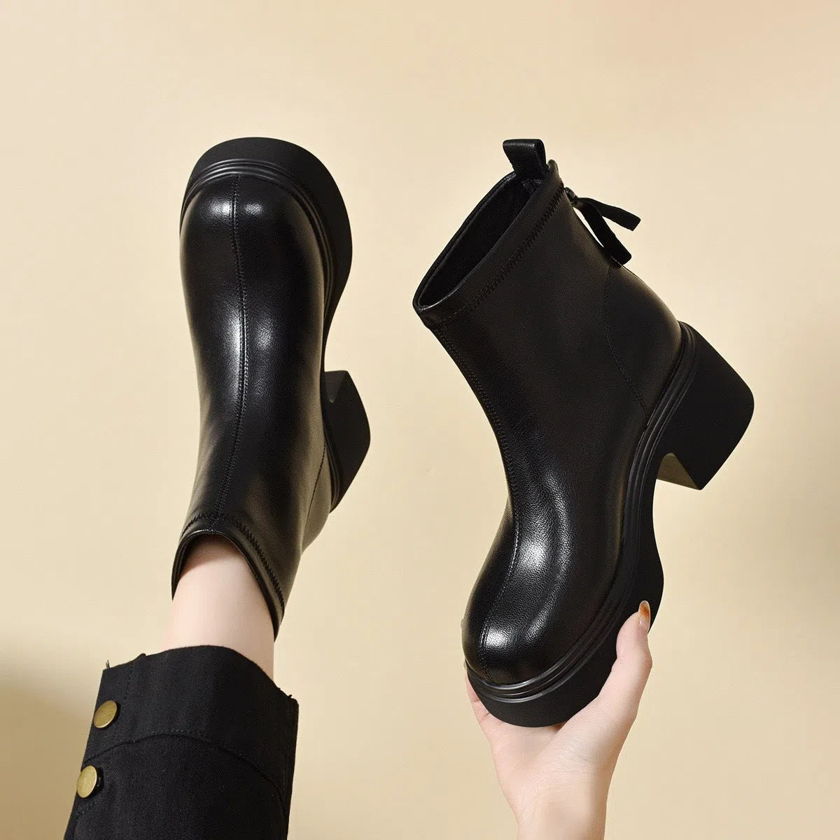 Black sheepskin shoes with cotton lining, flat heel, round toe, and water-resistant platform