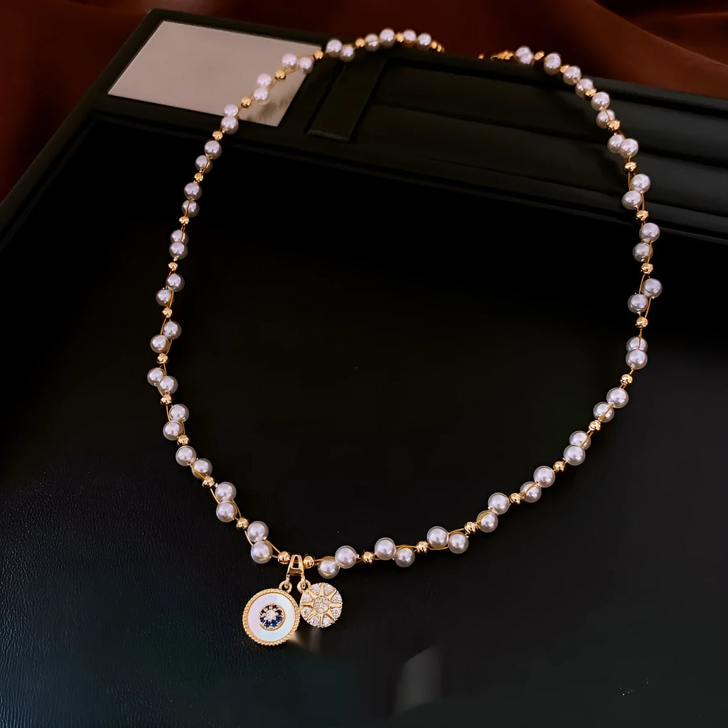 Gold electroplated pearl pendant necklace with adjustable 41-50cm clavicle chain and zircon inlaid details