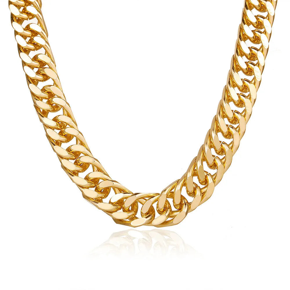 Women's gold thick chain necklace with a pendant on a model, showing its 32cm length.
