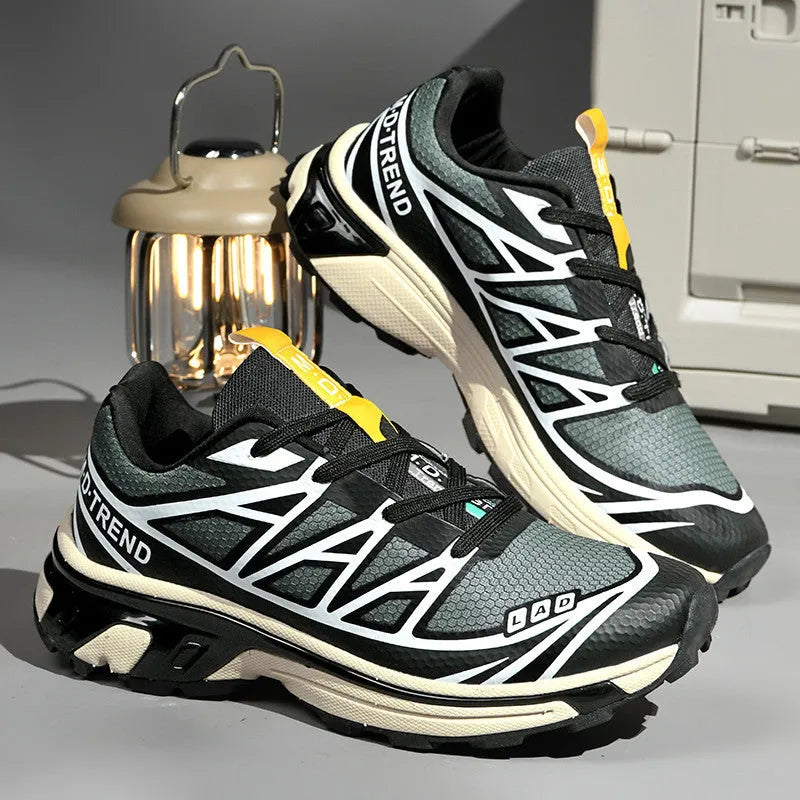 Low-top hiking shoes with artificial leather upper, mesh lining, and rubber sole in multiple colour options