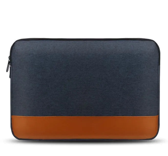 13-inch Oxford cloth tablet PC liner bag in grey with zip closure on a flat surface