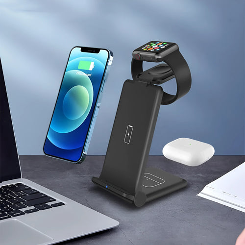 Black and white 3 in 1 foldable wireless charging station for iPhone, AirPods and Apple Watch on a desk.