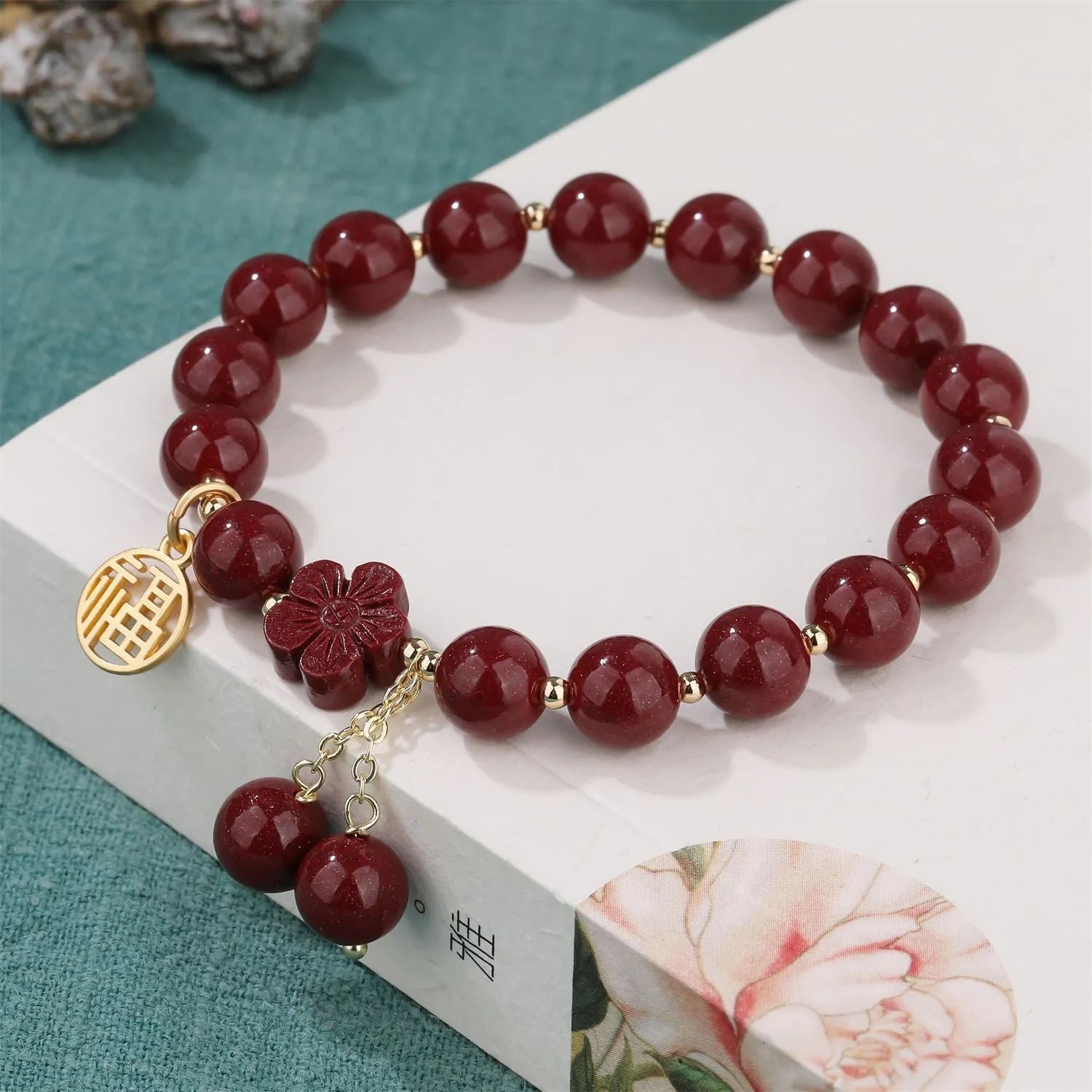 Women's cinnabar bracelet with purple gold sand colour and Fu character design elements
