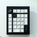 Black and white wireless mechanical numeric keyboard with three connectivity modes