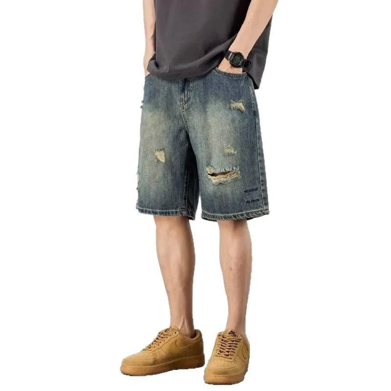 Men's loose fit washed blue denim shorts with straight leg and micro elasticity