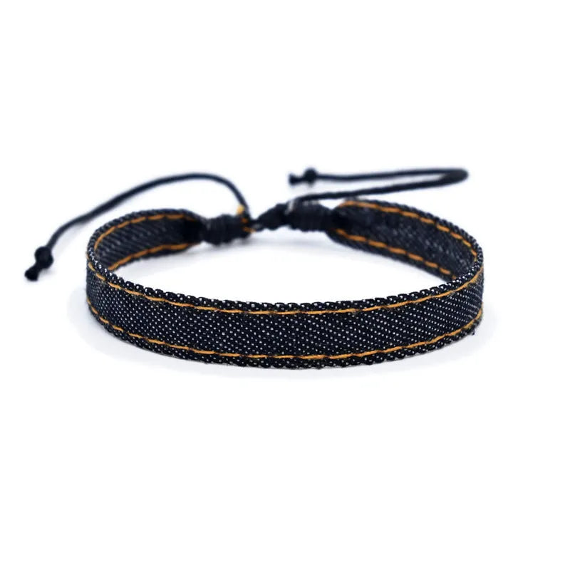 Denim fabric bracelet carrying strap with mixed materials, unisex design for travel