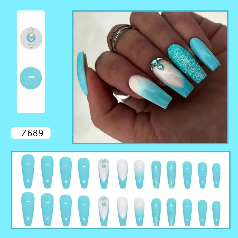 Blue false nails with diamond glitter accents in ballet shape, includes patches and glue