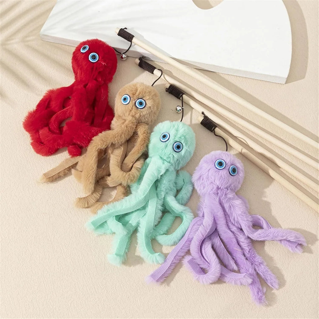 Grey furry octopus cat toy with eyes on a long stick for interactive indoor play with kittens.