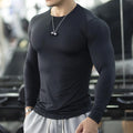 Men's black slim fit long sleeve fitness tights for running and gym workouts