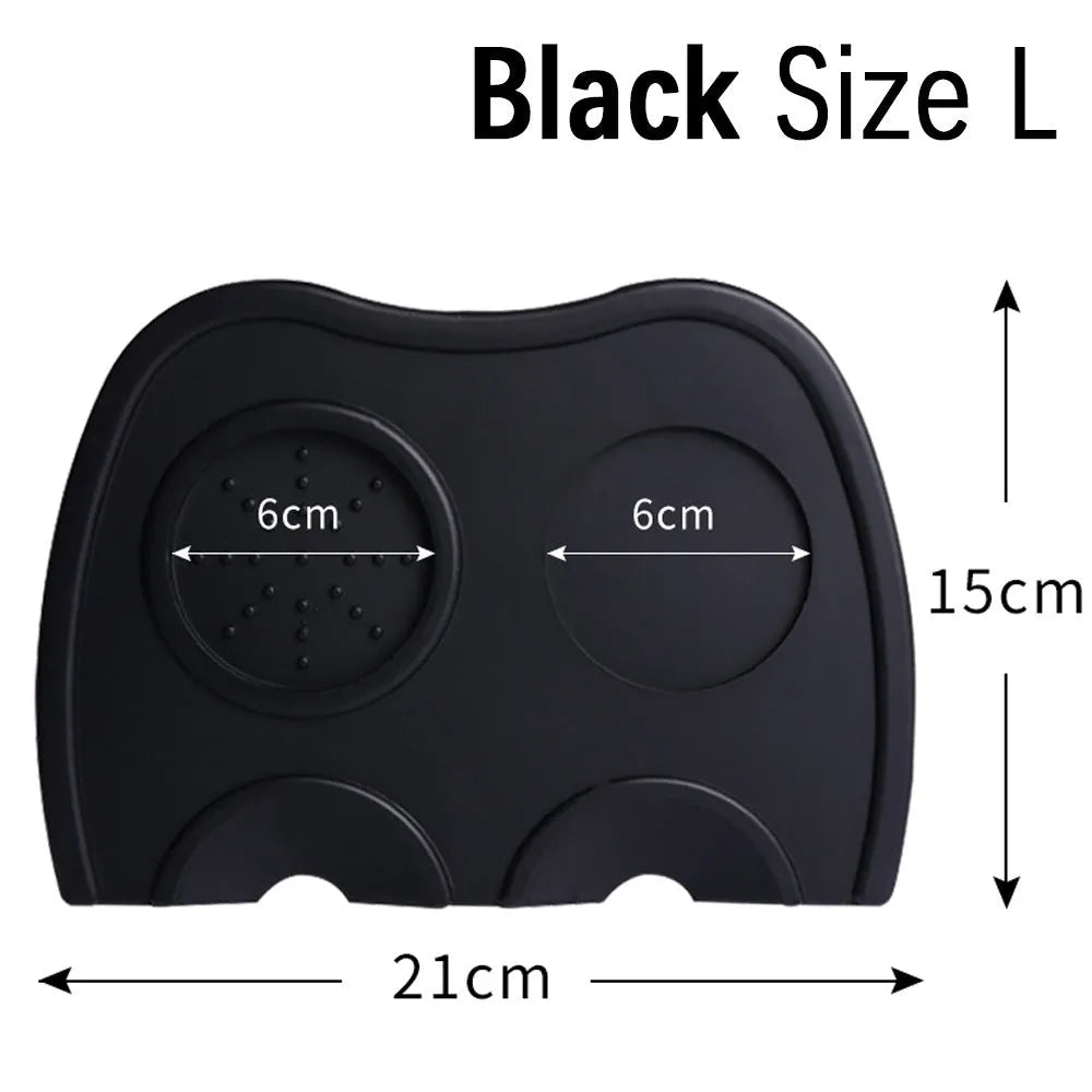 Black silicone coffee tamper pad with stainless steel base for non-slip espresso preparation