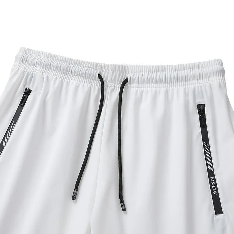 Men's black quick-drying nylon sports shorts with loose fit and fifth pants length