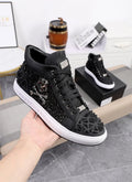 Men's black genuine leather skeleton high top shoes with red laces and a rubber sole.