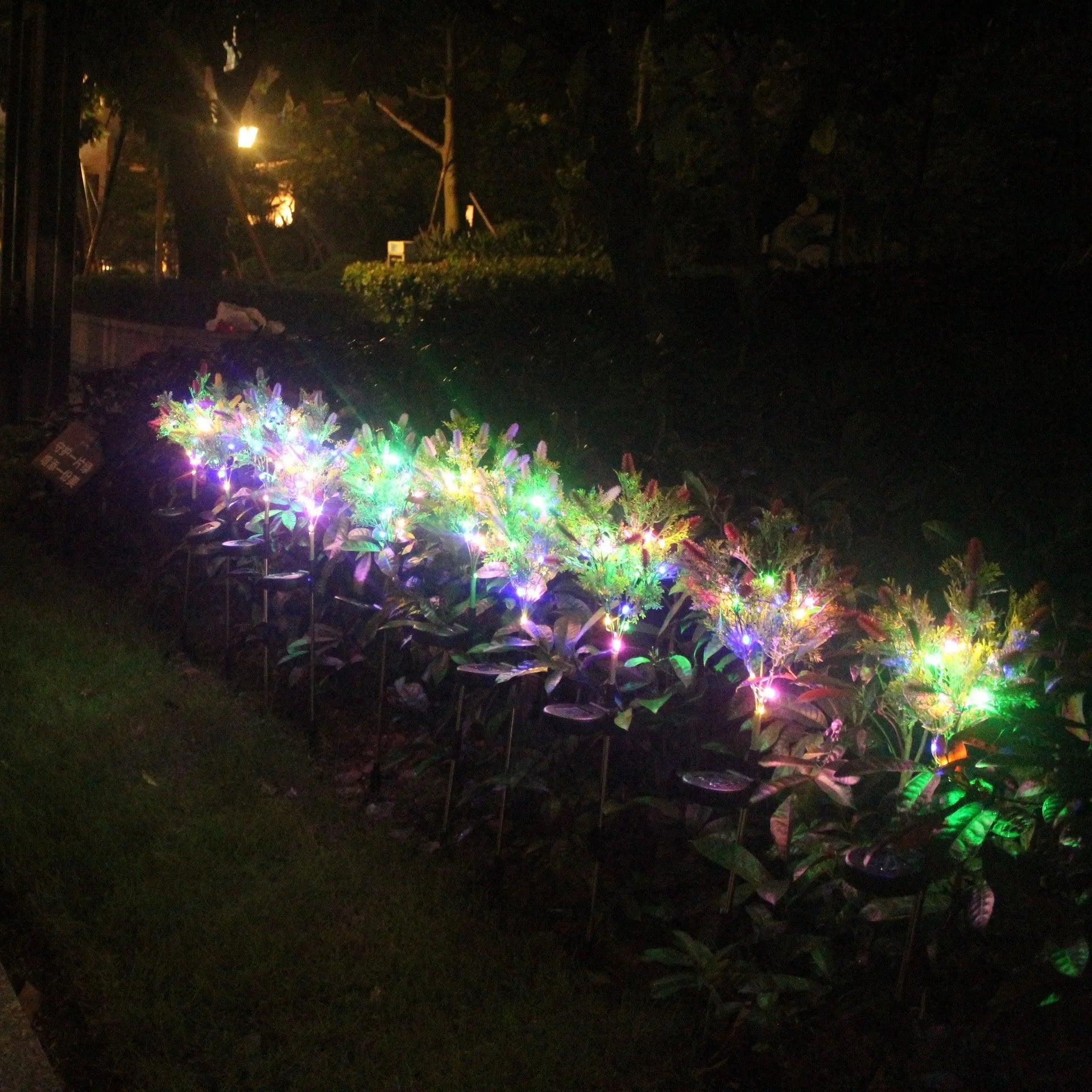 Led solar Christmas tree ground lamp with 15-color LED 70cm height in purple and red