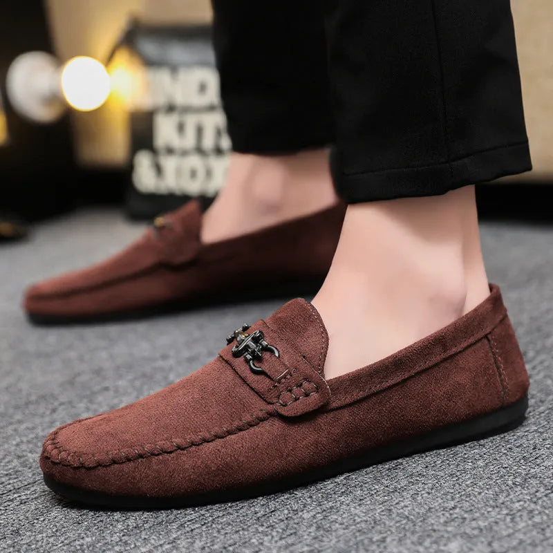 Men's black waterproof PU slip-on loafers with a round toe and low stiletto heel on a rubber sole.