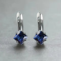Women's copper earrings with diamond design pattern and zircon inlaid gemstones in blue, green and colour variations