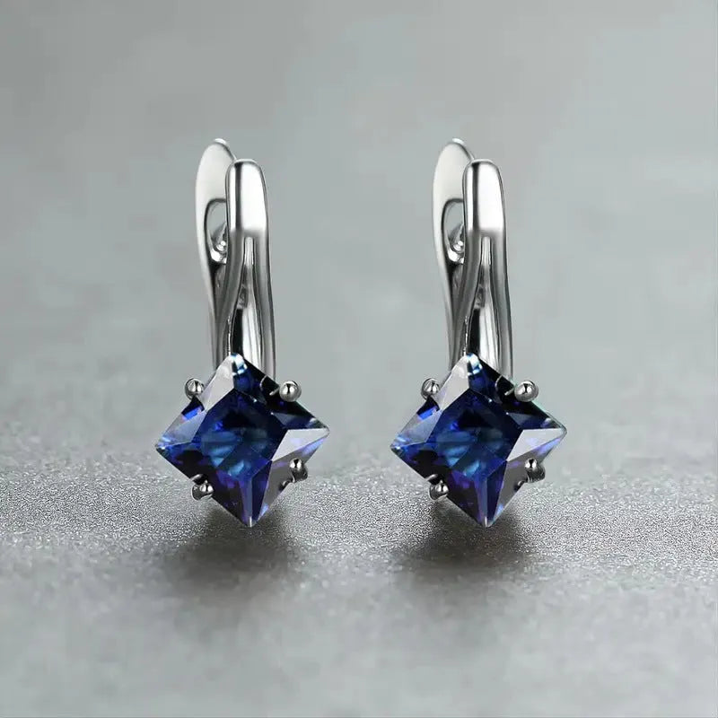 Women's copper earrings with diamond design pattern and zircon inlaid gemstones in blue, green and colour variations